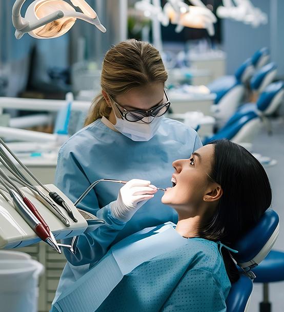 Dentist treating patient
